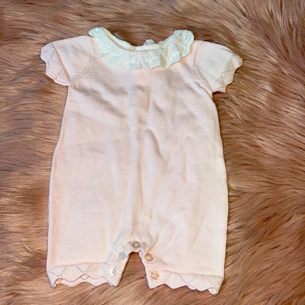 NB light pink EdgeHill Collection with button details and ruffle neckline